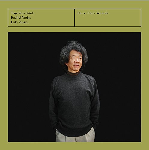 CD cover with a man in a dark turtleneck against a black background.