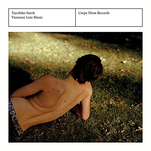CD cover: person with dirt on back kneeling in grass.