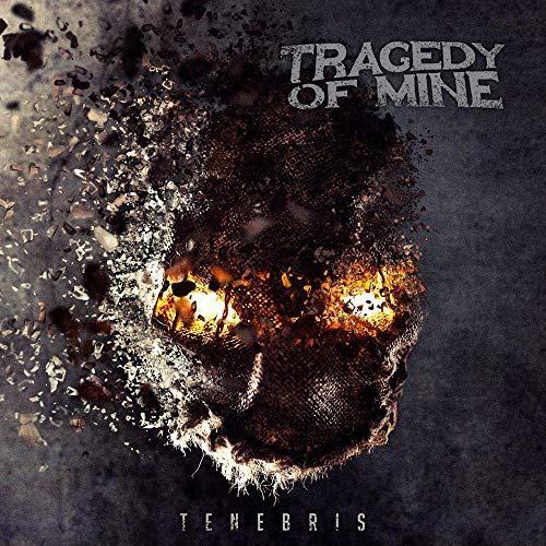 CD cover for "Tragedy Of Mine - Tenebris" featuring a fractured face.