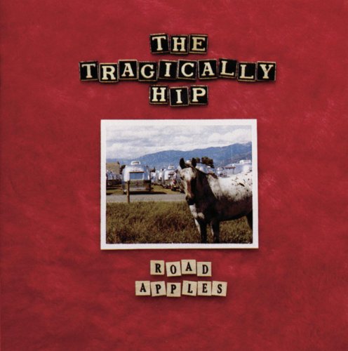 Red album cover with a cow photo and "The Tragically Hip" and "Road Apples" text.