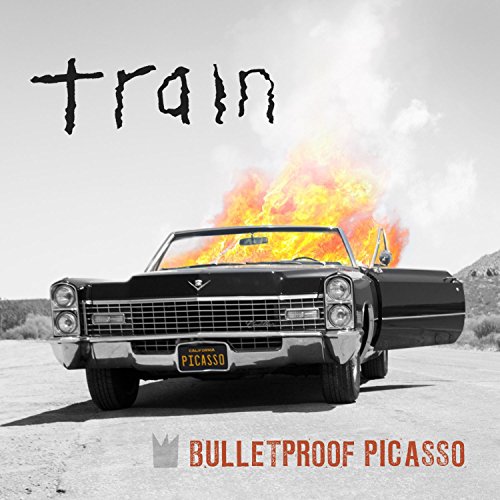 CD cover: black classic car with flames, desert background, "Train" text.