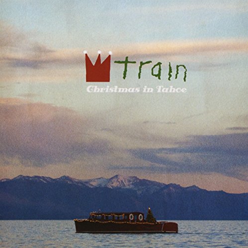 Train album cover: snowy mountains, lake, boat, and red crown logo.