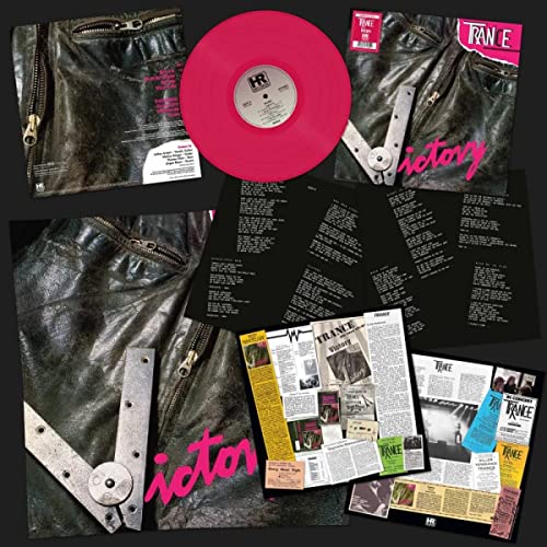 Magenta vinyl record with album cover, inner sleeves, and lyric inserts.