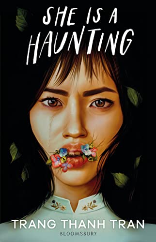 Book cover: woman’s face with flowers covering her mouth, dark background.