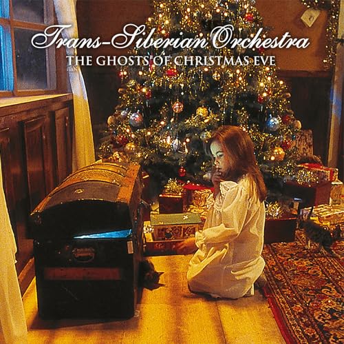 Album cover: girl by Christmas tree and old trunk.