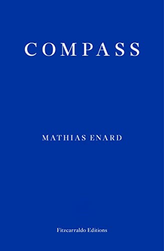 Book cover with a solid blue background, white text reading Compass, Mathias Enard, Fitzcarraldo Editions.