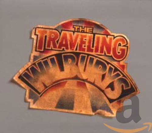 The Traveling Wilburys logo with orange and black text against a road background.