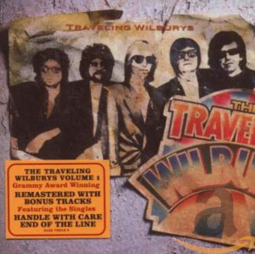 Traveling Wilburys Vol. 1 CD cover with portraits of five musicians.