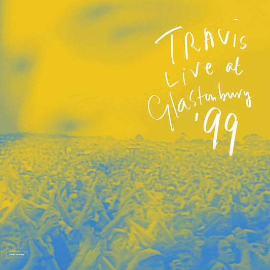 Yellow and blue abstract album cover with white text "Travis Live at Glastonbury '99".