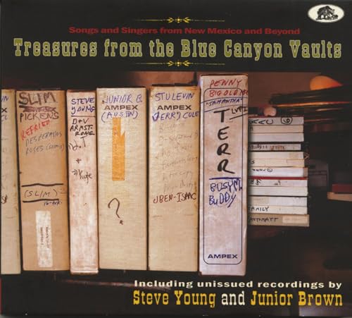 CD cover featuring a shelf of vintage reel-to-reel tapes.