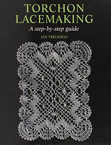 Book cover with white lace on a black background, titled "Torchon Lacemaking".