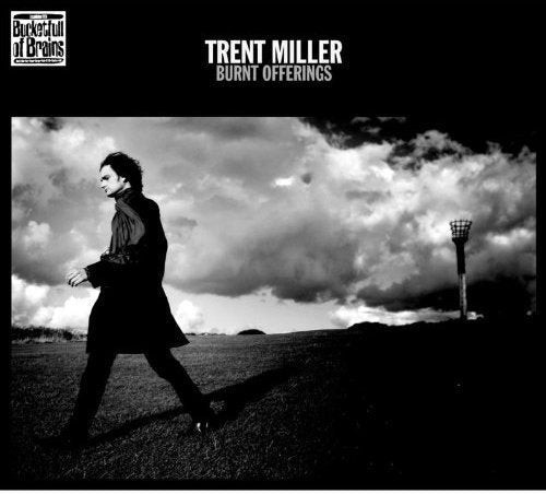 Album cover for "Burnt Offerings" by Trent Miller, featuring a man walking in a field.
