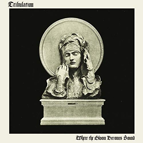 Vinyl album cover featuring a sepia-toned statue of a woman on a pedestal.
