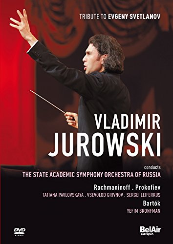 DVD cover featuring a conductor in a black suit holding a baton, with red curtain.