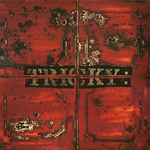 Red textured album cover with gold lettering reading “Tricky - Maxinquaye”.