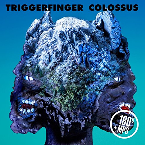 "Vinyl album cover with a rocky, monstrous head and glowing eyes."