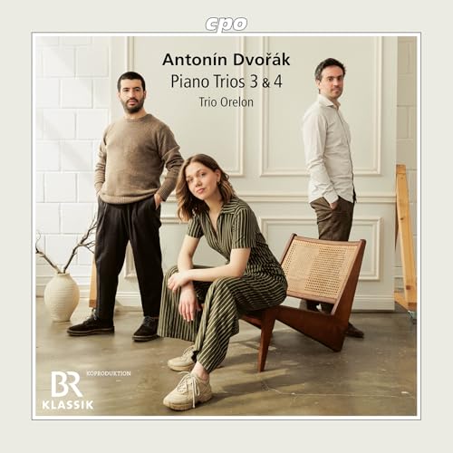 CD cover featuring three people and text: "Antonín Dvořák Piano Trios 3 & 4".