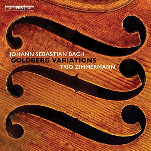 CD cover featuring a close-up of a violin’s f-holes and text.