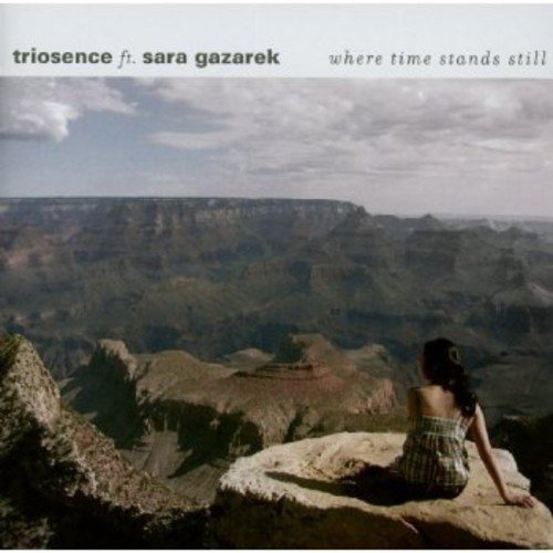 CD cover with a woman overlooking a vast canyon landscape.