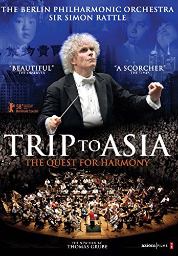 DVD cover for "Trip to Asia" featuring an orchestra and conductor.