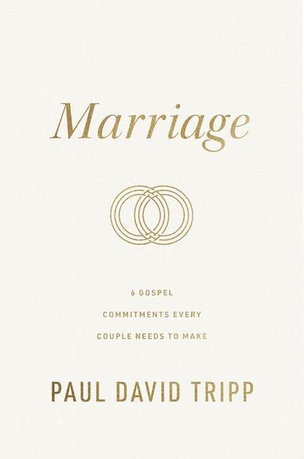 Book cover: "Marriage" by Paul David Tripp, with gold lettering and rings.