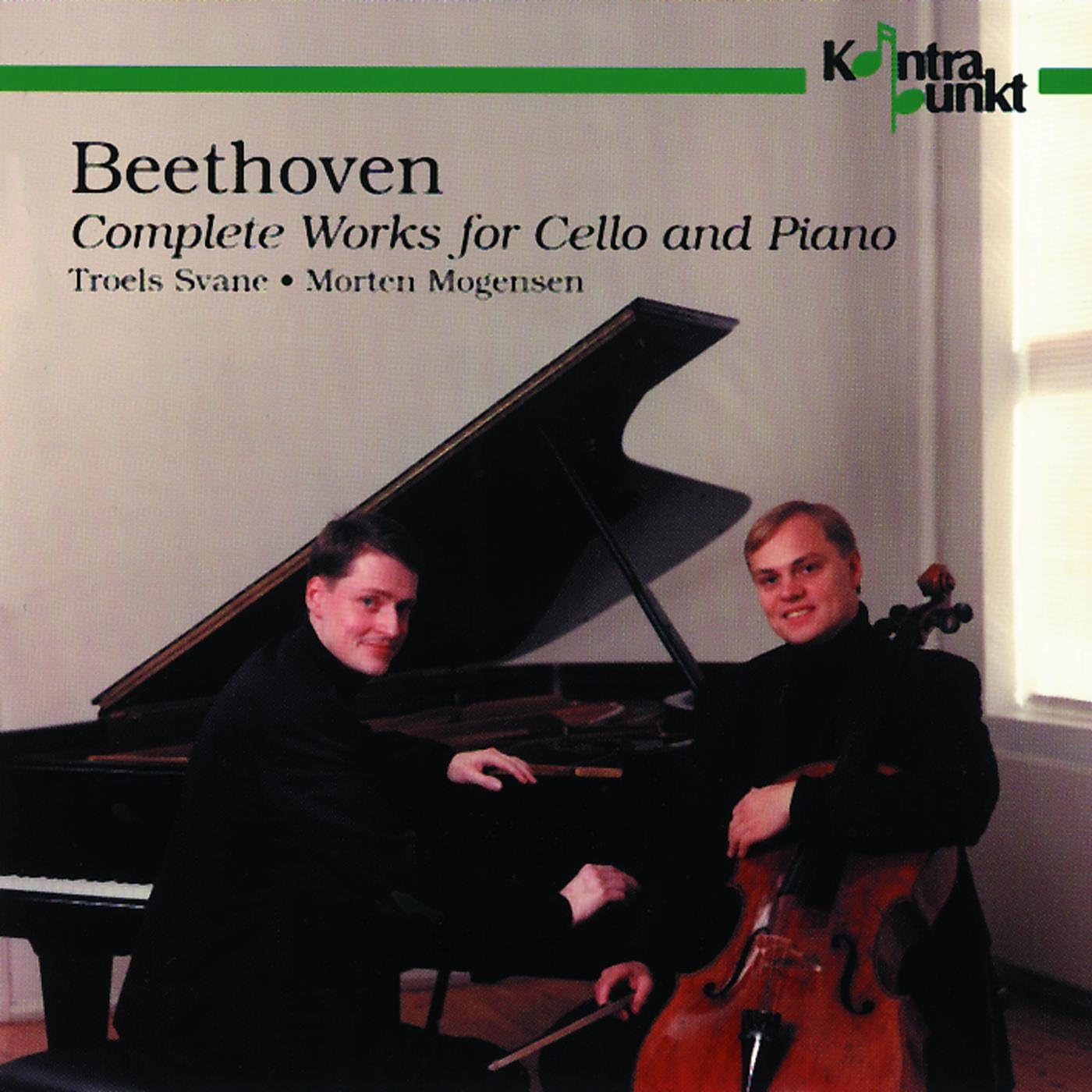 CD cover featuring two musicians with a piano and cello.