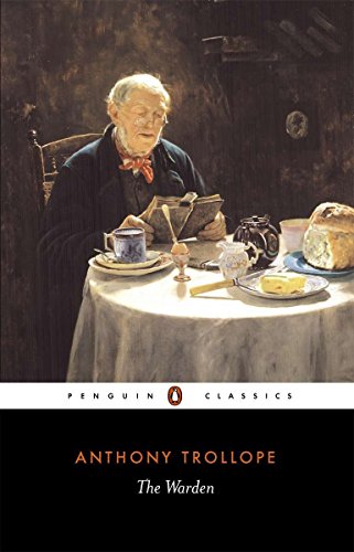 An elderly man sits at a table reading a book with breakfast items nearby.