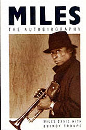 Book cover featuring a sepia-toned portrait of Miles Davis holding a trumpet and wearing hat.
