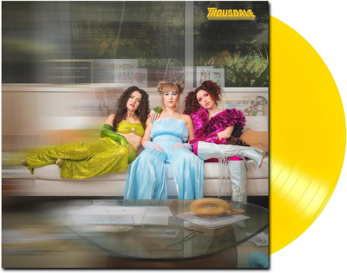 Opaque yellow vinyl record in a square album cover titled Trousdale Growing Pains.