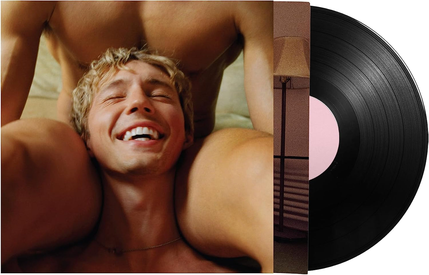 Troye Sivan vinyl record featuring a close-up portrait and abstract design.