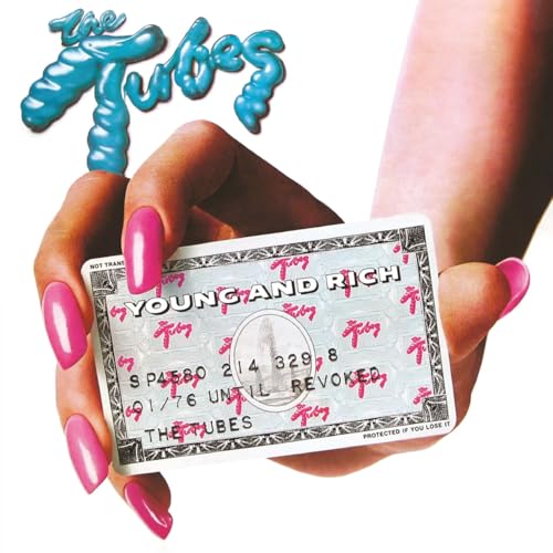 Hand with bright pink nails holding a credit card labeled Young and Rich.