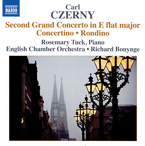 CD cover featuring a street scene with illuminated lampposts and a cathedral.