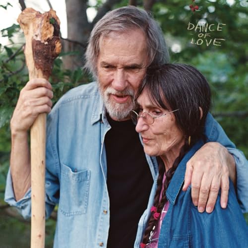 CD cover featuring an older man and woman embracing outdoors.