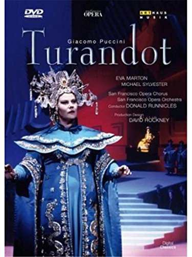 DVD cover featuring a woman in ornate blue costume and headdress, opera background.