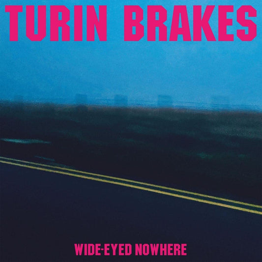 The alt text for this image is: "Album cover with road and cityscape, 'Turin Brakes Wide-Eyed Nowhere'."