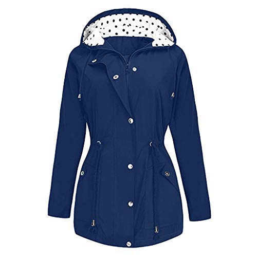 Navy blue women’s hooded raincoat with white polka dot lining.