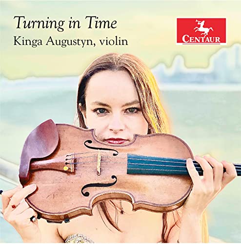 CD cover featuring violinist Kinga Augustyn holding a brown violin.