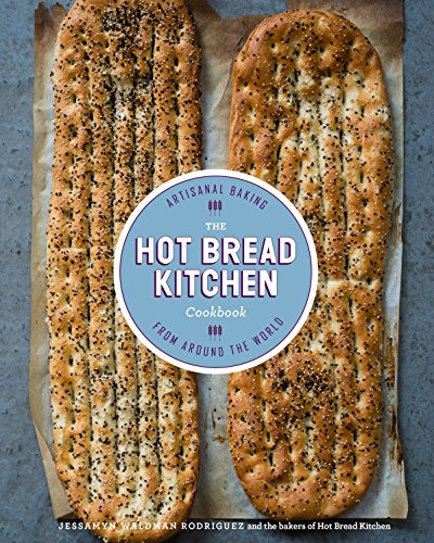 Cookbook cover featuring two seed-covered flatbreads and circular title text.