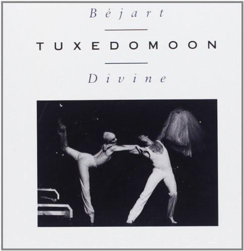 CD cover: dancers in white suits performing a dramatic lift.