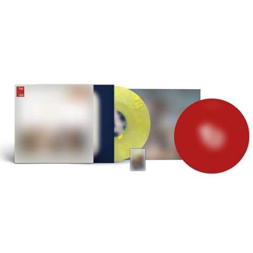 TWICE vinyl record with yellow disc, red insert, and white sleeve.