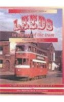 Red tram on a street in Leeds, England, circa 1950s book cover.