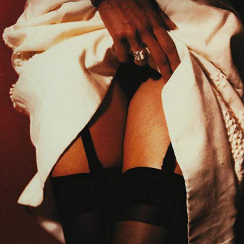 CD cover for Twilight Singers’ “She Loves You” featuring a partial figure.