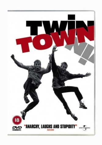 DVD case with "Twin Town" title, two men jumping, and "18" rating on white background.
