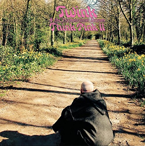 CD cover: man sitting on a dirt road in a forest.