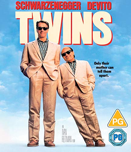"Movie cover for 'Twins' featuring two men in matching beige suits against a blue sky."