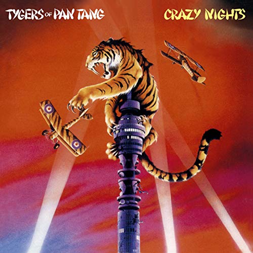 A tiger clings to a tall communications tower with biplanes flying against a red sky.