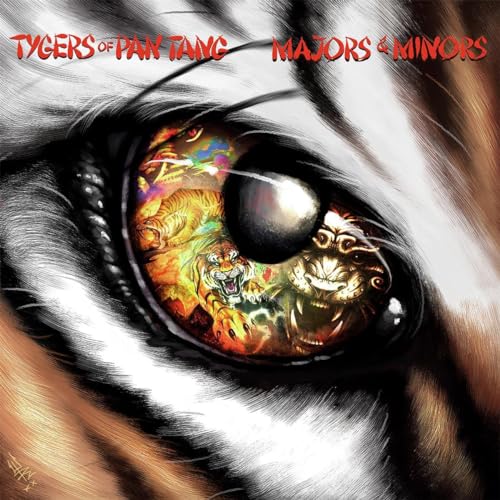 Close-up of a tiger’s eye with album title “Tygers of Pan Tang.”