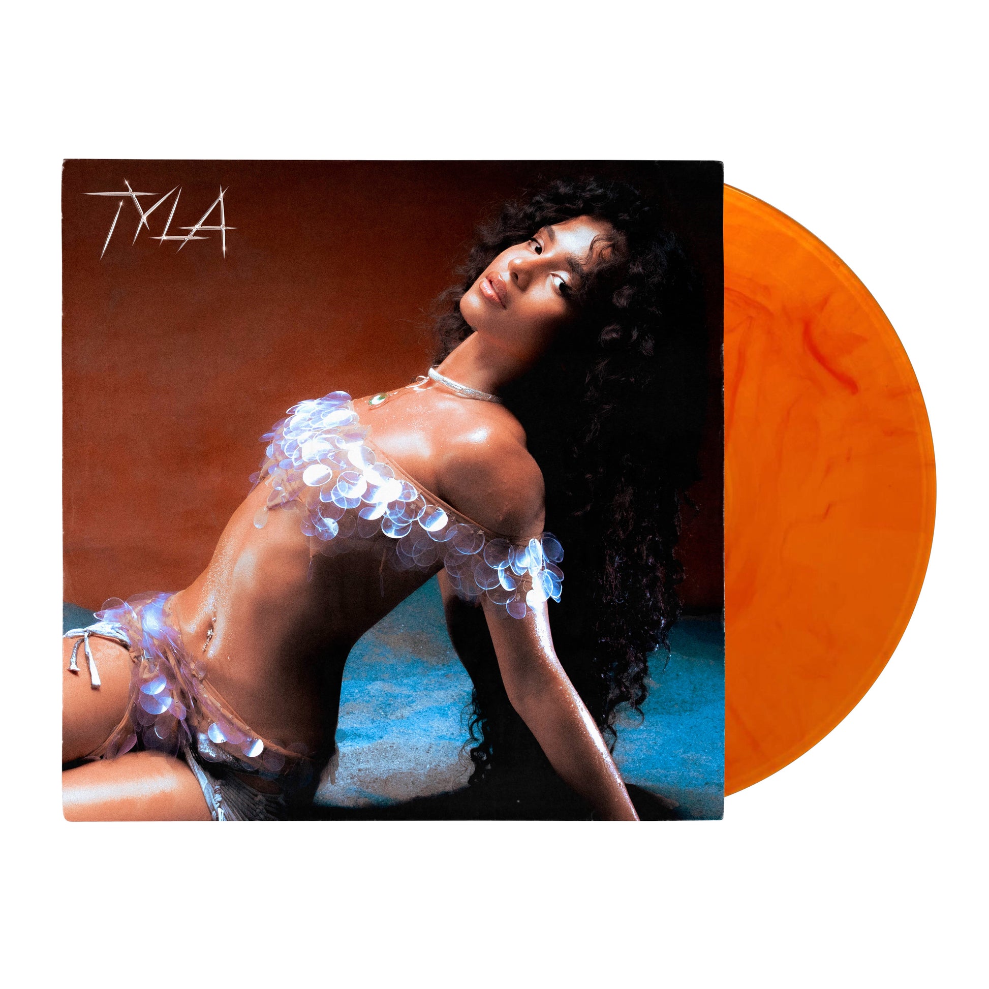 Tyla album cover featuring a portrait and orange vinyl record.