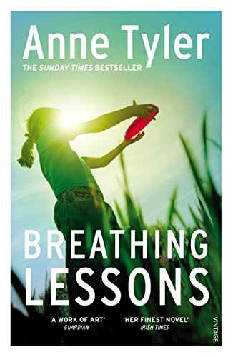 Red book cover with a woman holding a frisbee, surrounded by tall grass.