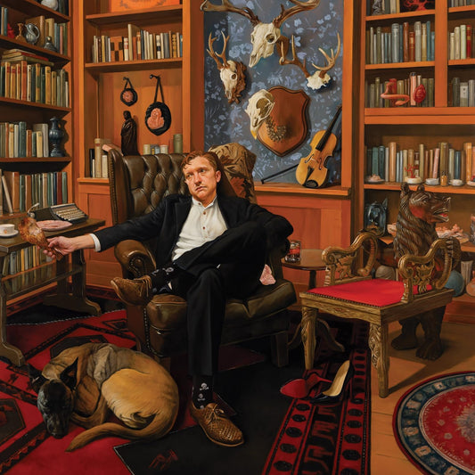Tyler Childers album cover: man in a chair, ornate room, dog.